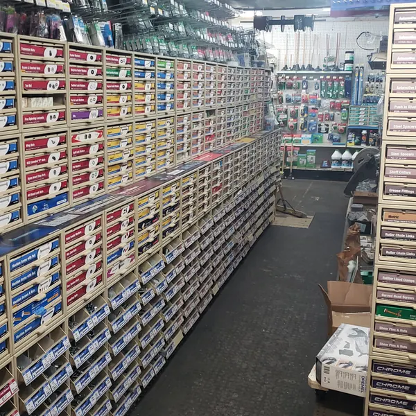 Drawers of machine screws, nuts and bolts line the fastener aisle inside the Worcester hardware store.